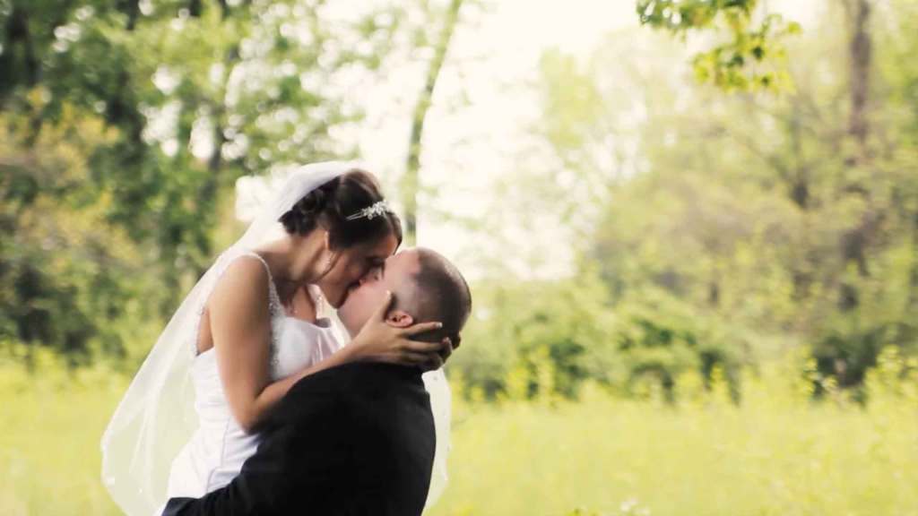 Experience the magical wedding of Derek and Leah at The Ritz Charles featuring a beautiful ceremony and a lively reception.