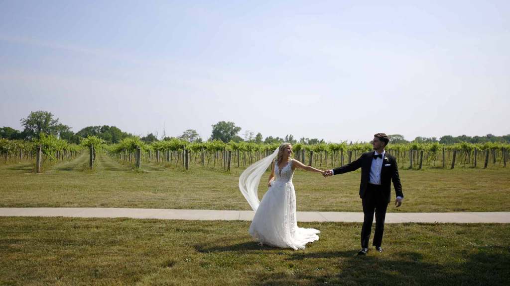 Emily and Alex had a big city Indianapolis wedding at St. John's Cathedral and chill reception at Daniel's Vineyard.